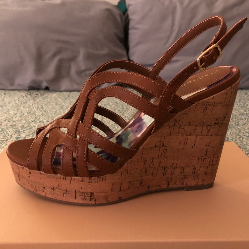 Brown strappy wedges with adjustable ankle strap.